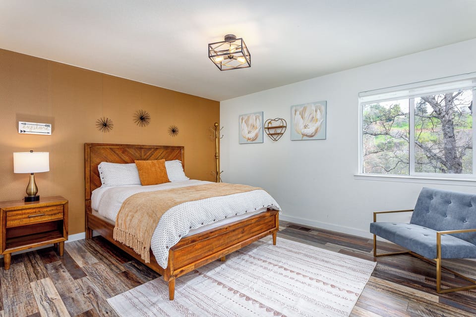 2nd Bedroom - 1 Queen bed with a window that has breathtaking views of the River