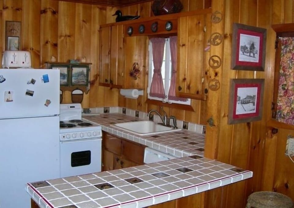 Cozy kitchen has all of the conveniences of home