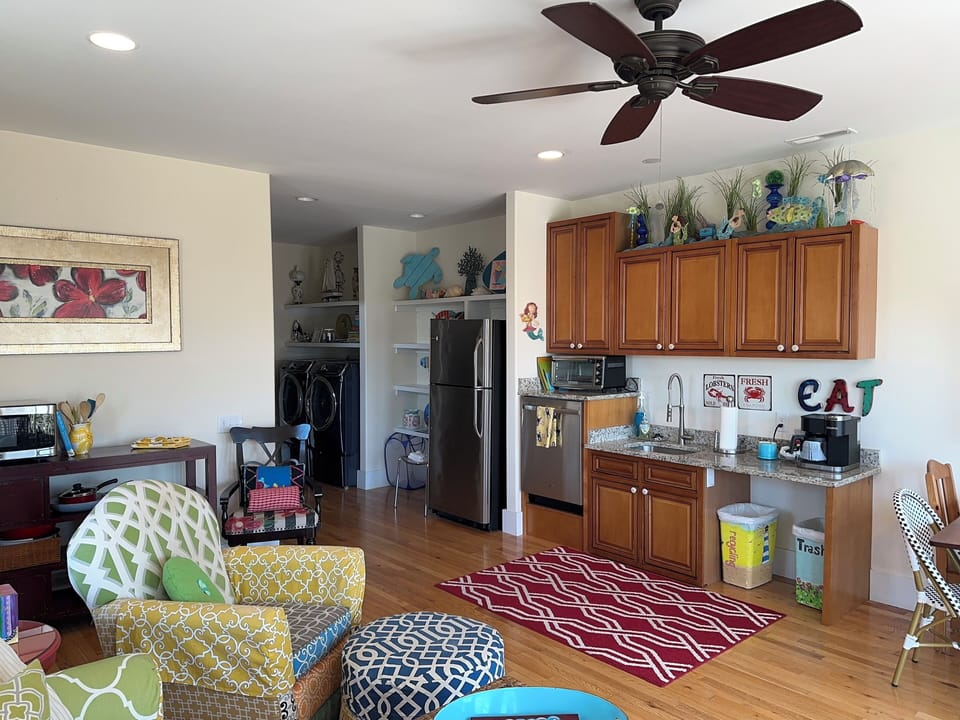 Kitchenette with wheel-under counter.