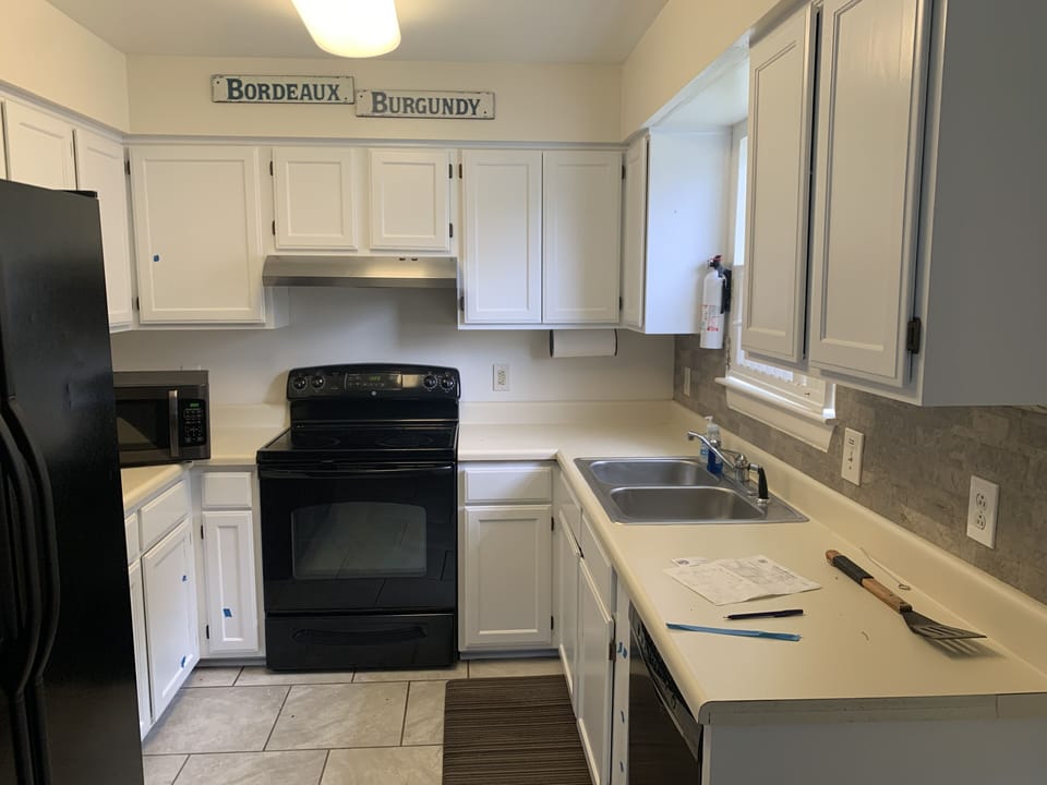 Full kitchen with dishwasher and microwave 
Basic dishes and cookware 