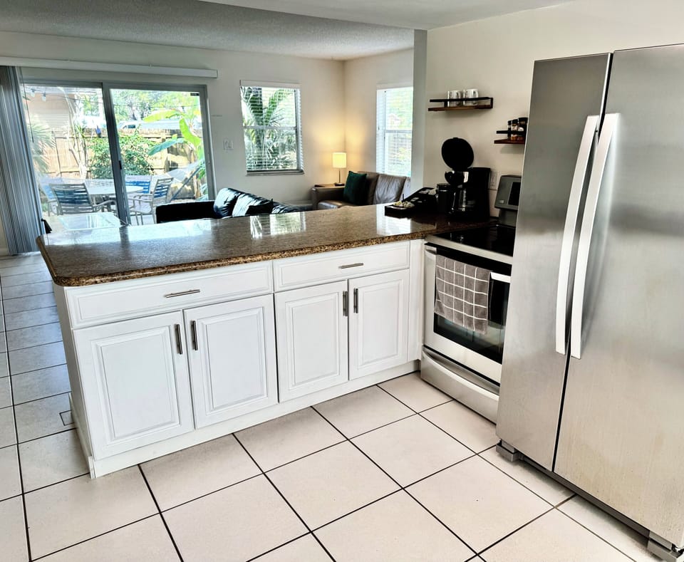 Open-concept fully equipped  kitchen. 