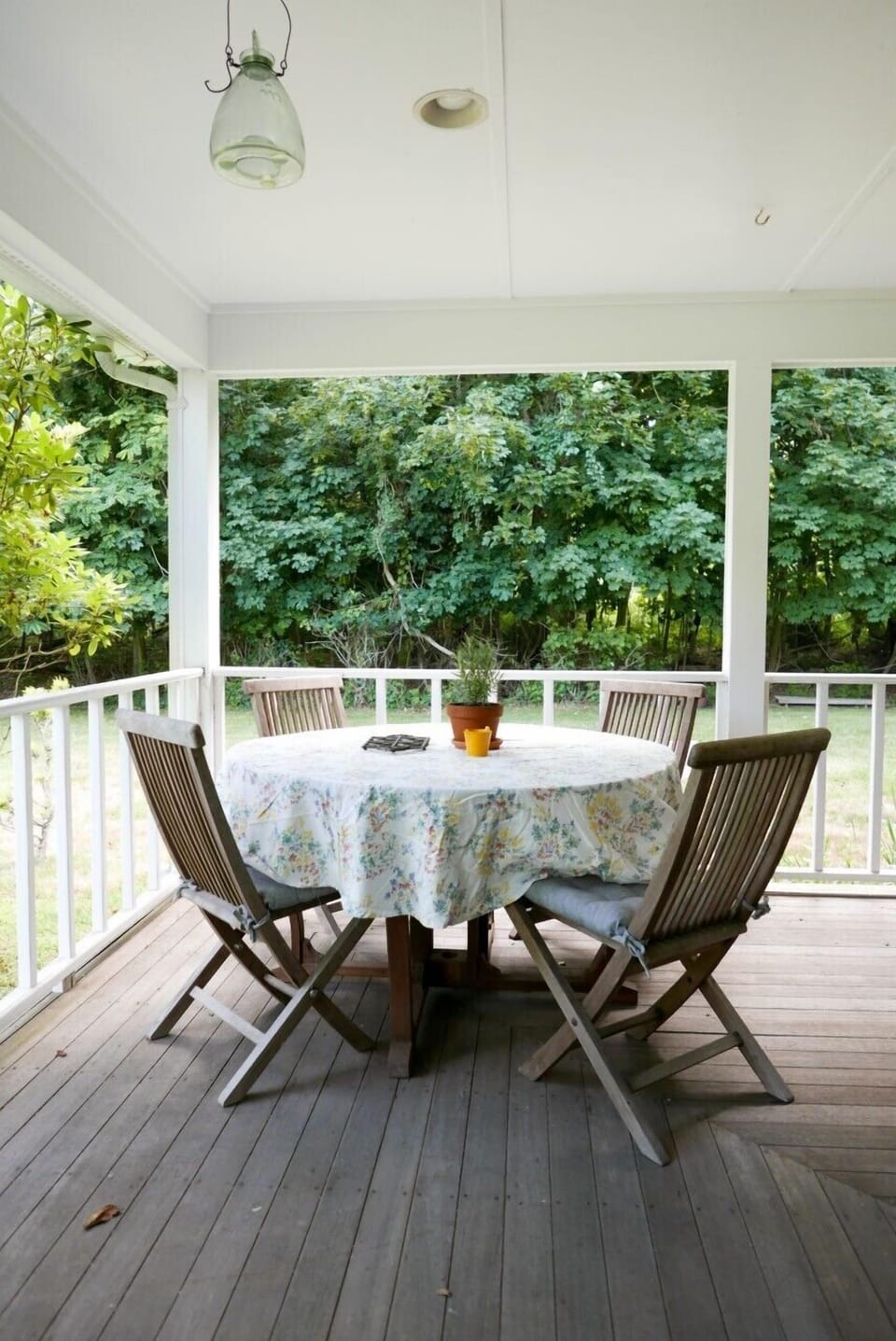 Enjoy a relaxing meal on the spacious wrap around porch.