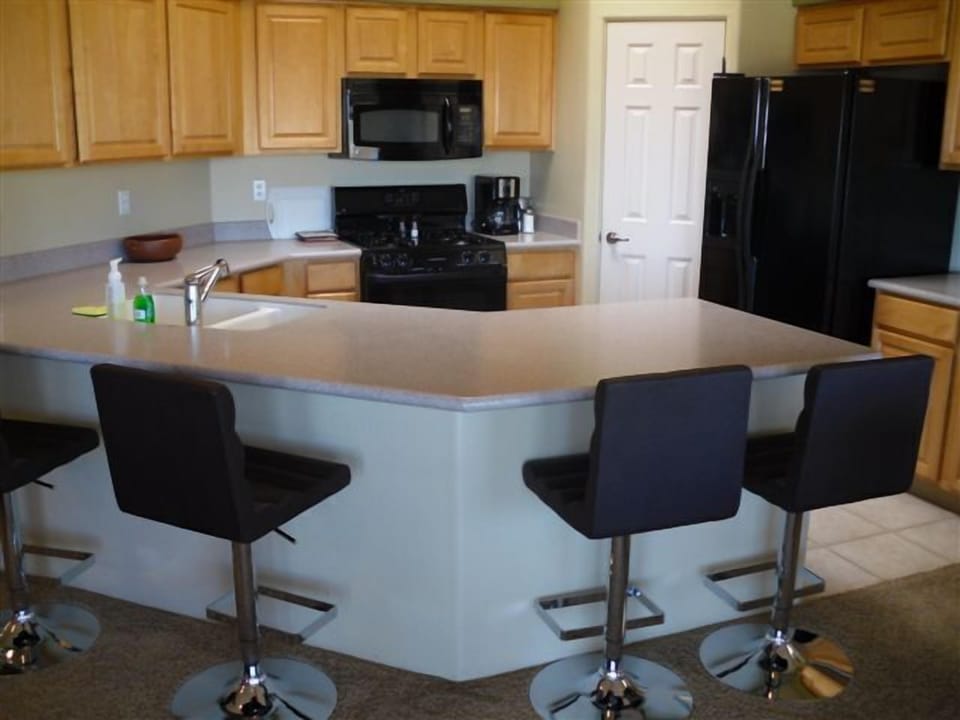 kitchen open to living room, dining room