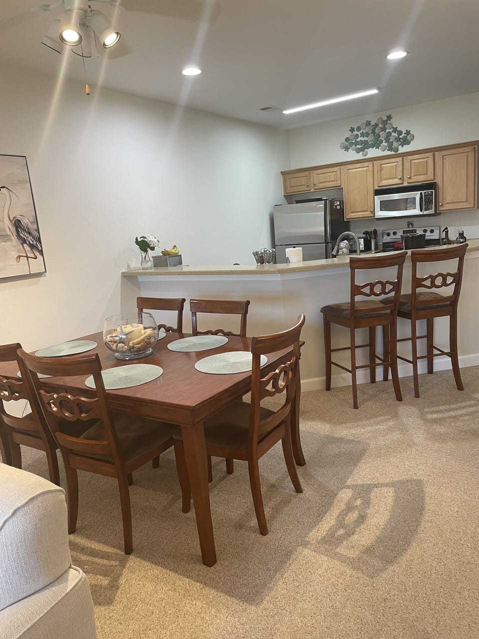 Well stocked kitchen and dining area.
