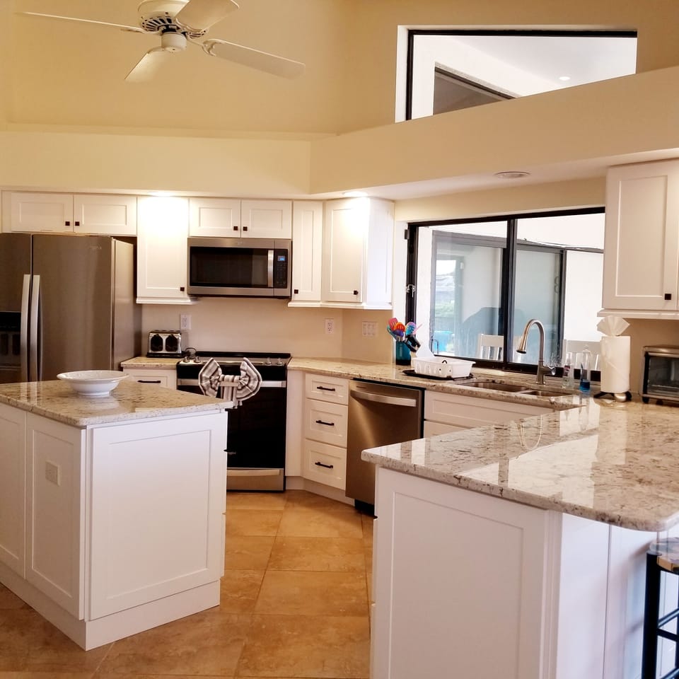 The kitchen has an open floor plan and is fully equipped for cooking