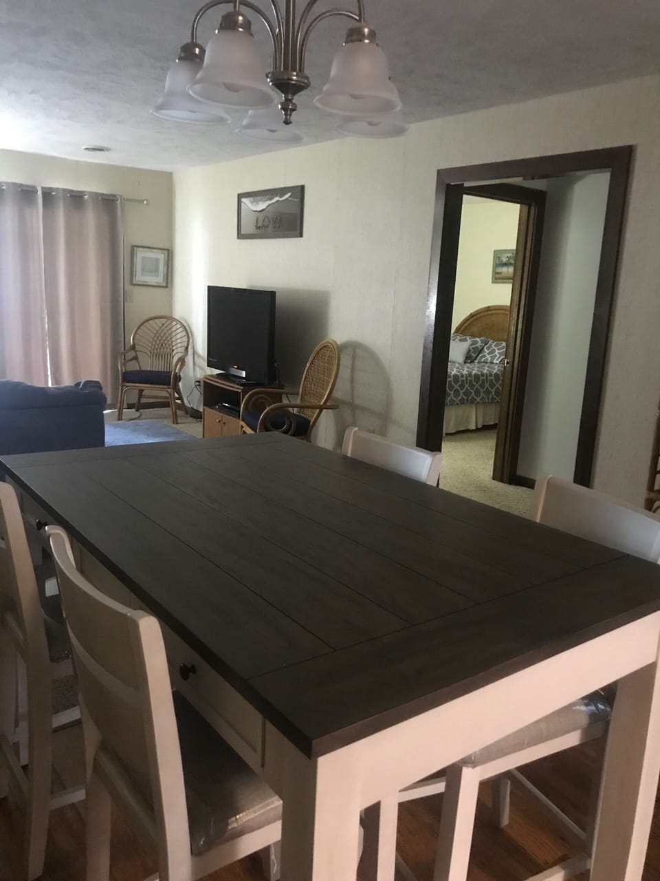 View from kitchen into master bedroom