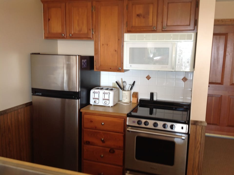 Kitchen area with new ceramic top stove