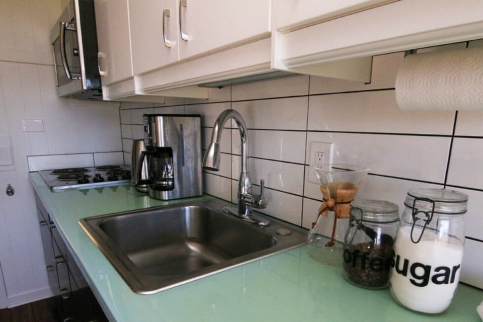 Kitchen with Turquoise Countertops. 