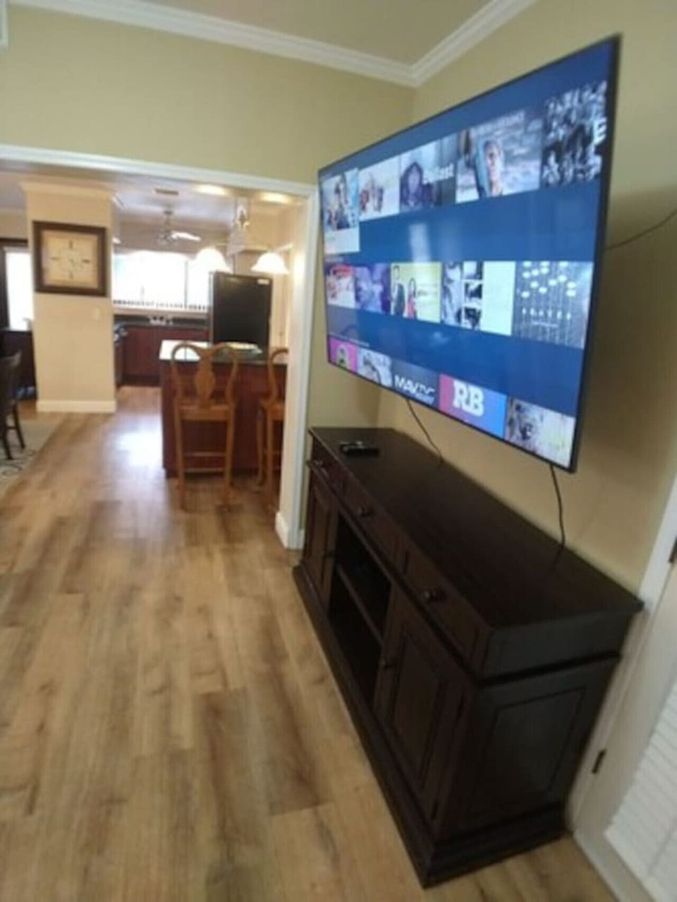 Living room has 70 inch TV with Netflix, Hulu, and tons of other channels.