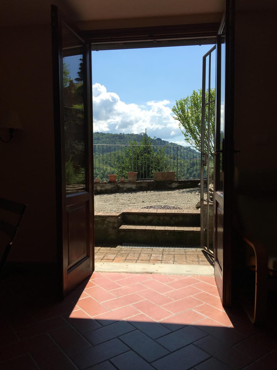 The living room exits onto the garden and patio.