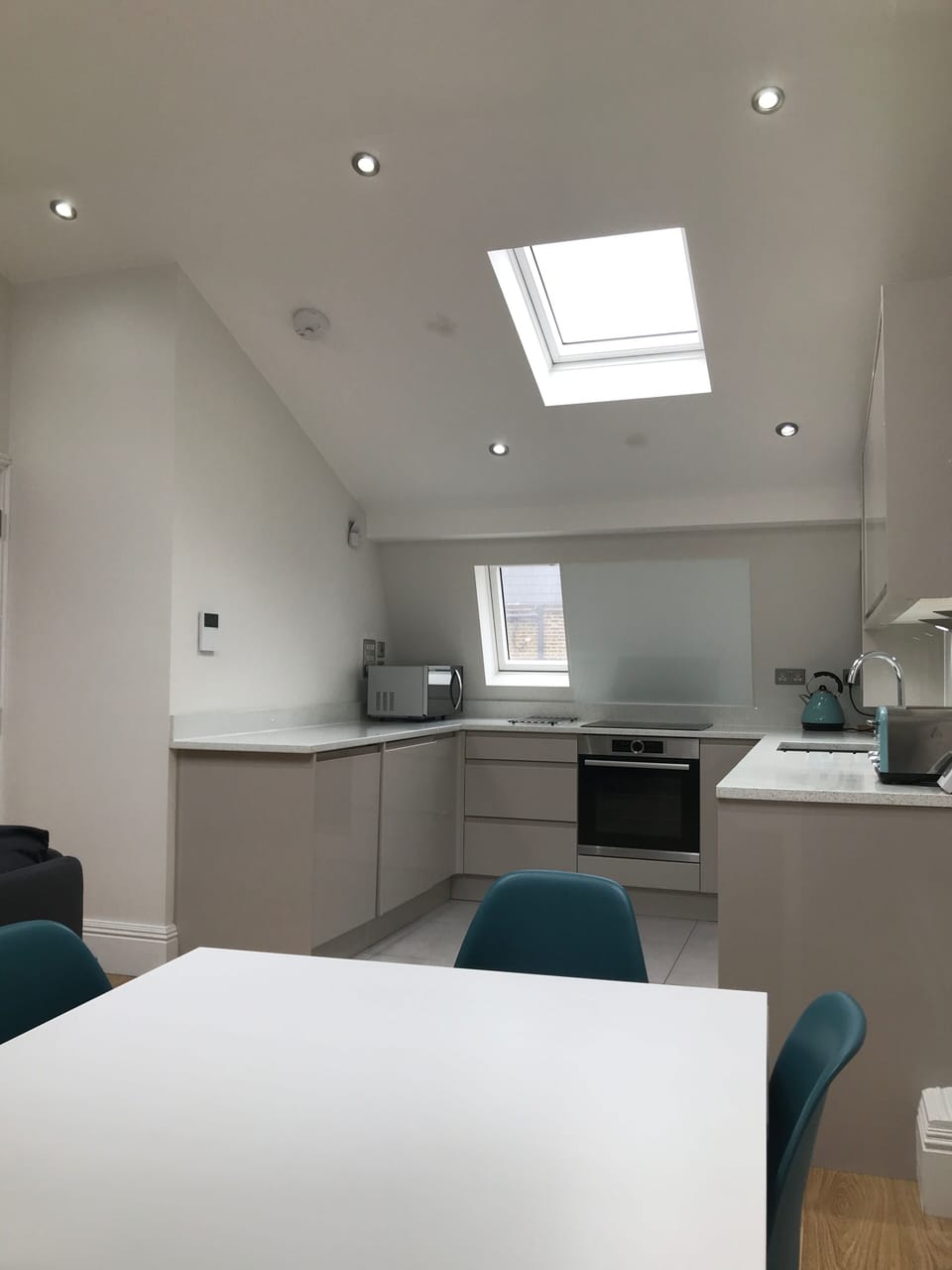 Kitchen situated at the rear of the top floor living area