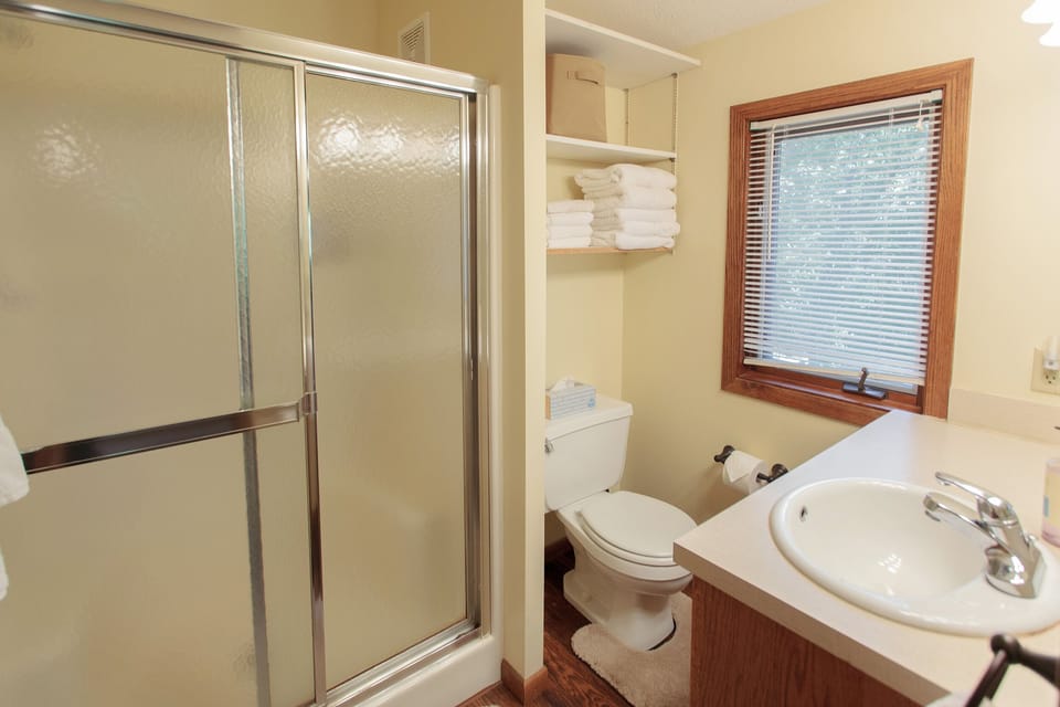 Bathroom and shower in loft.