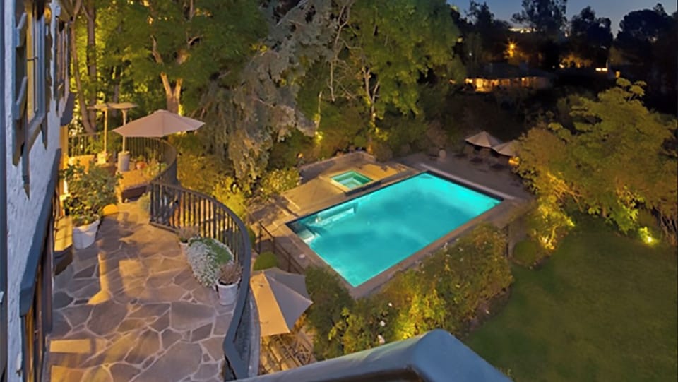 Heated pool with Huge gated yard.