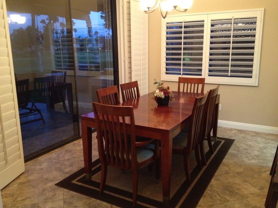 Dining room table that will accommodate six and we also have three barstools overlooking the kitchen. 
