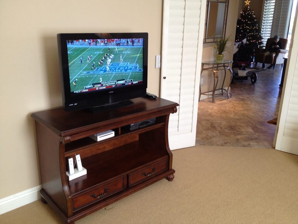 Thrid room has a large Vizio HDTV with new furniture and couch that pulls out.