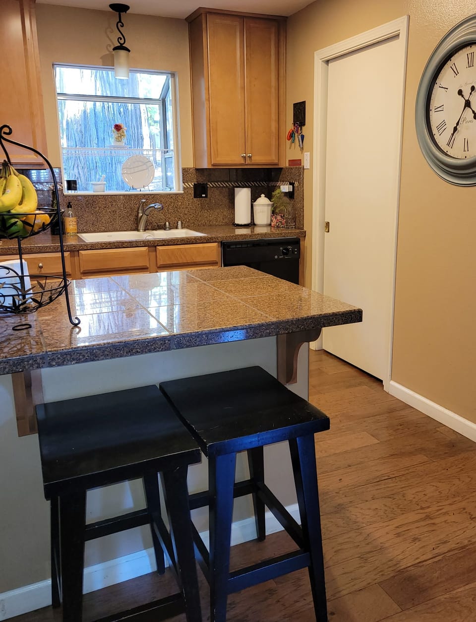 Breakfast bar attached to kitchen
