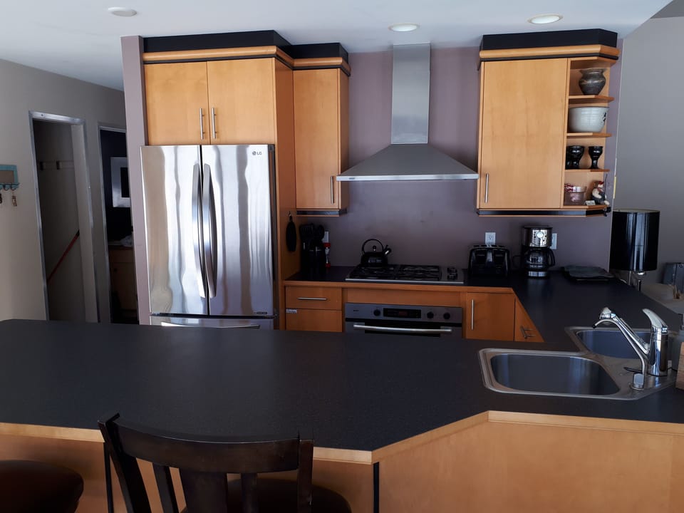 Create home cooked meals in the well stocked kitchen.