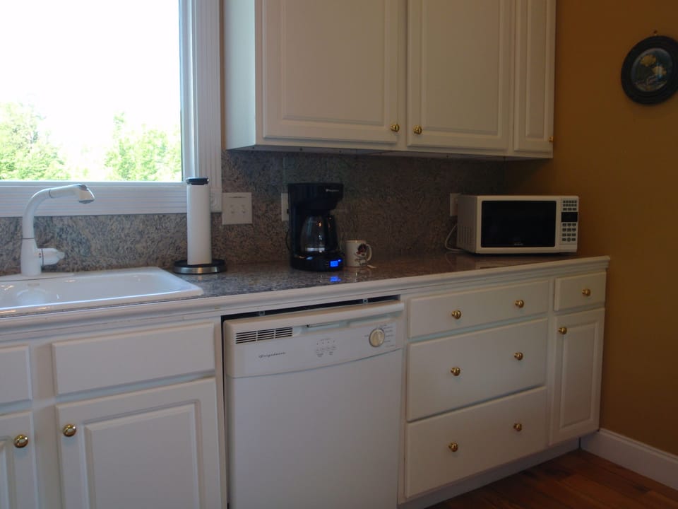 Sink, dishwasher, coffee maker and microwave