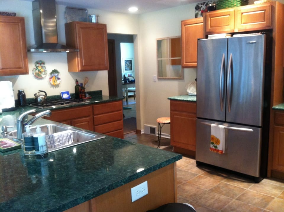 Kitchen,fully stocked with blender,coffee pot/espresso machine, pots, pans,mixer