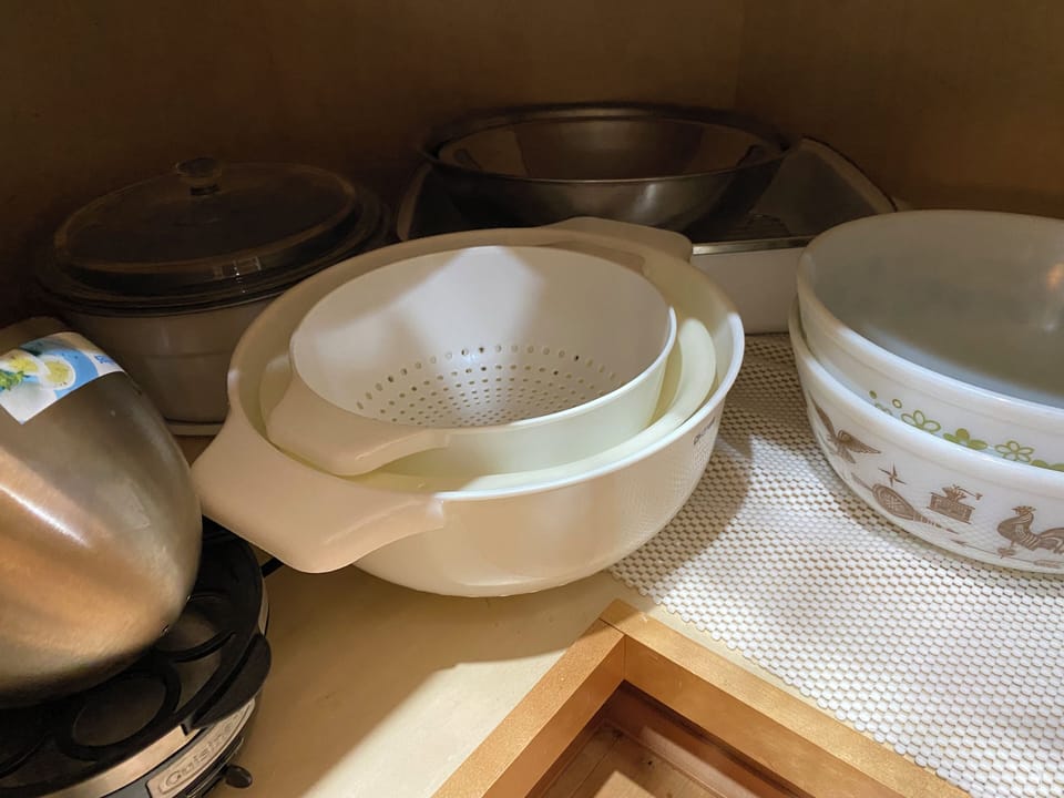 Kitchen left corner filled with dishes for your cooking needs.