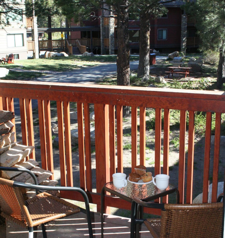 Summer time enjoy your coffee on the balcony. View of the courtyard.