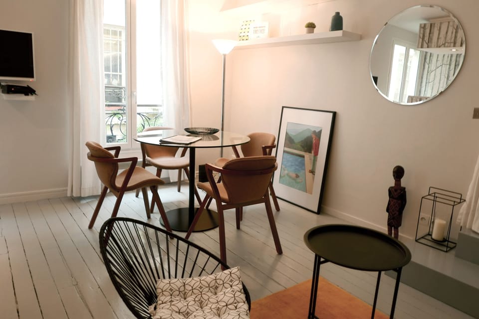 The dining area offers a comfortable table for up to 4 persons