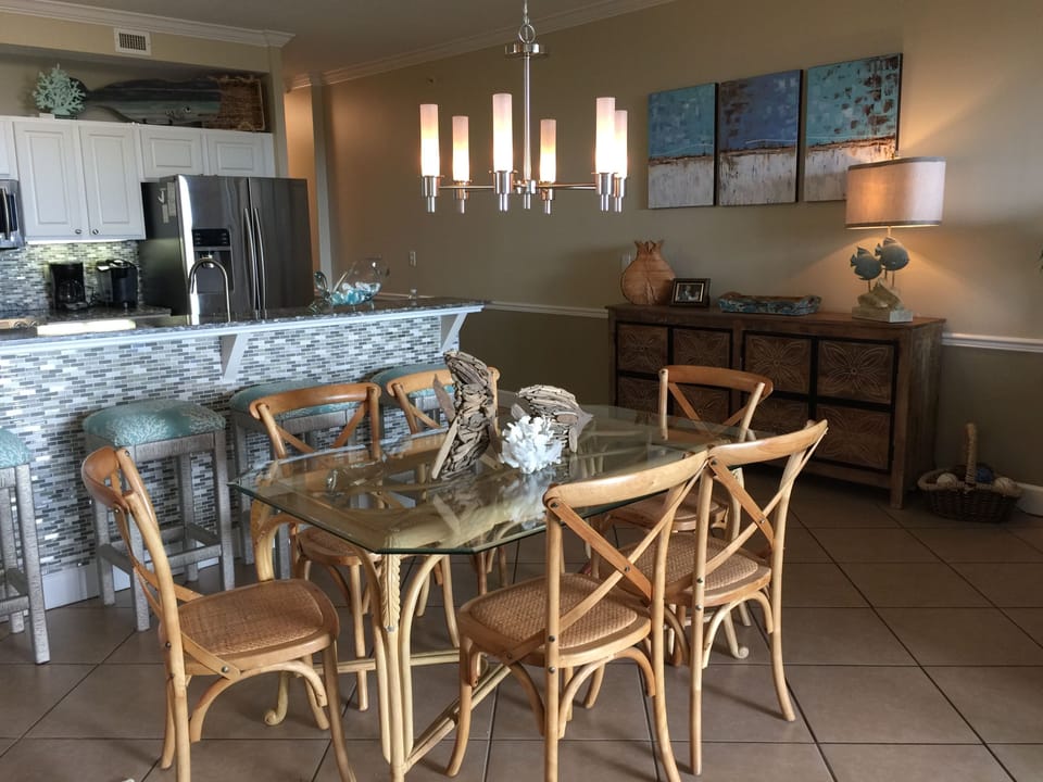 Dining table with modern dimmable chandelier