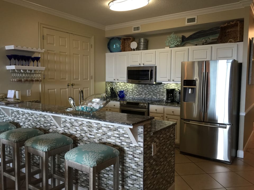 Wine glass storage and Barstools for casual seating 