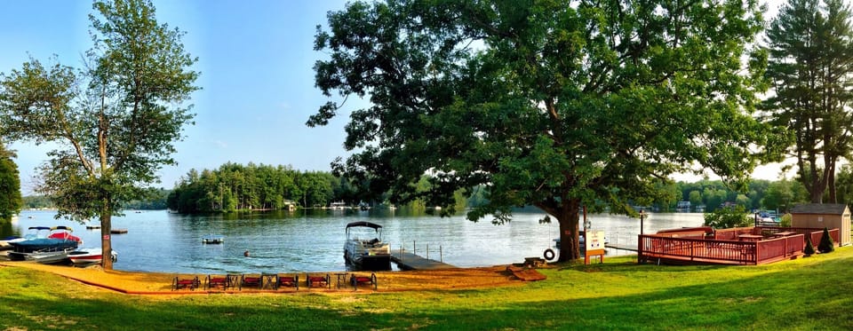 Private 2.5 acre beach , docks, lounge chairs, sun deck, tire swing & fire pit