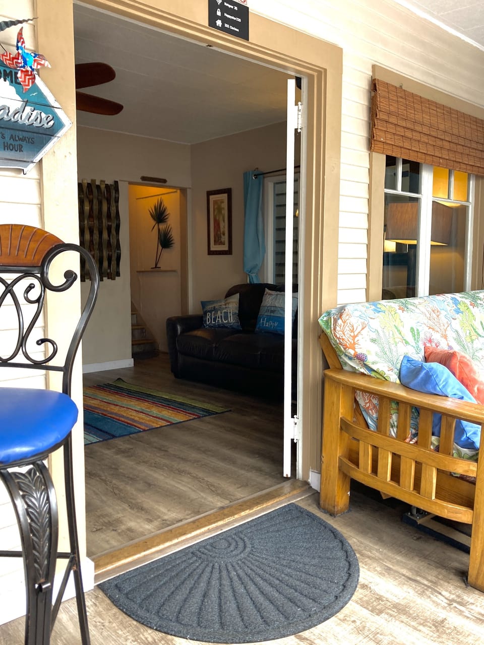 Cozy SunPorch at the front of the house! Large windows open for ocean view