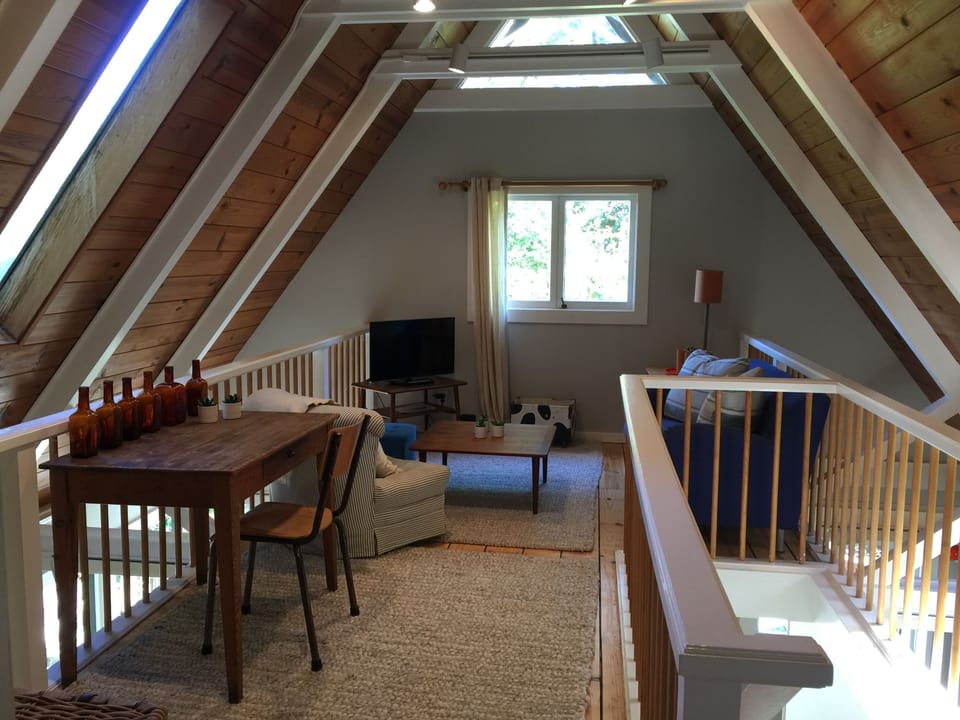 View from master bedroom to loft area (flat screen TV has free Netflix shows and movies for adults and kids, just no regular or cable TV)