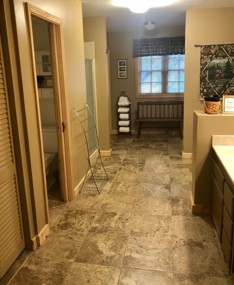 Primary Bathroom
Shower, tub, double sink, washer & dryer, 2 closets