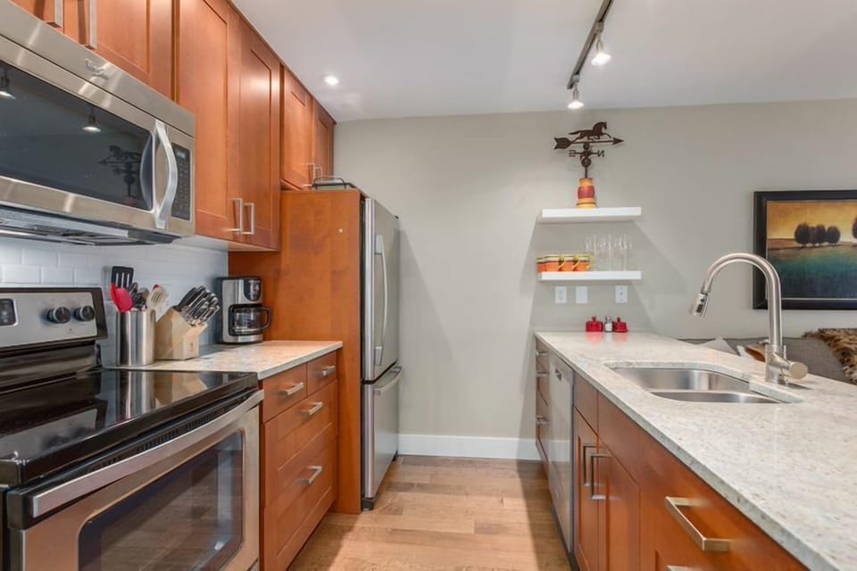 New appliances in this well stocked kitchen.
