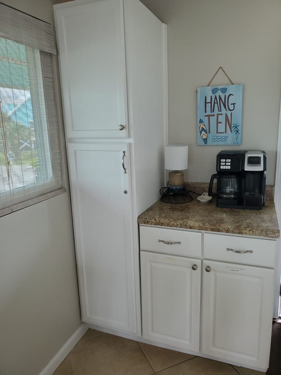 Coffee bar and pantry. Keurig K-duo coffee maker with both pot and k-cup brewing