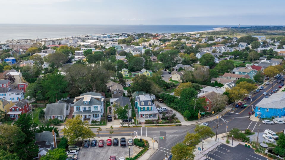 Aerial view looking south towards lighthouse, sunset beach and other sites