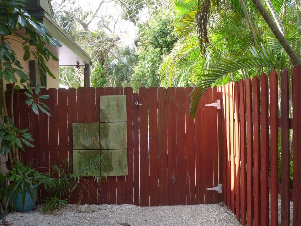 Ceramic tiles on garden gate!
