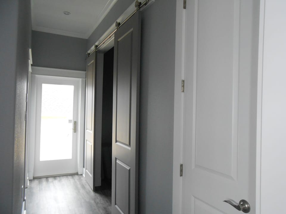 Side entry with Barn doors to Laundry Room
