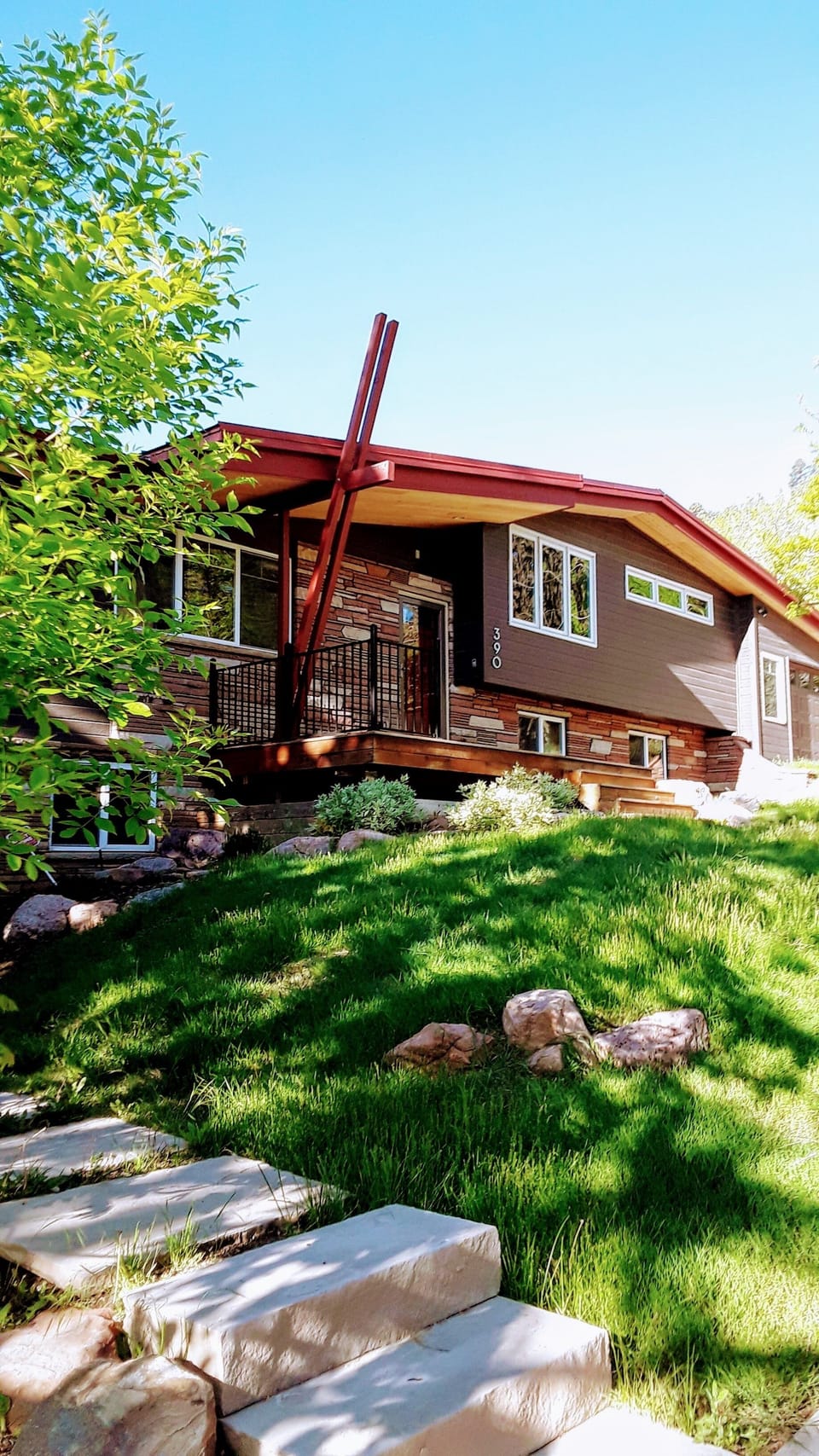 Modern home with natural prairie grass  landscape.  Premier Boulder location.