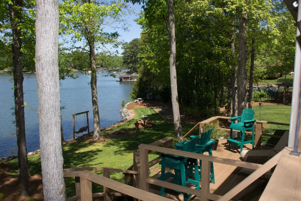 Lower deck 3 tall chairs and 2 lounge chairs