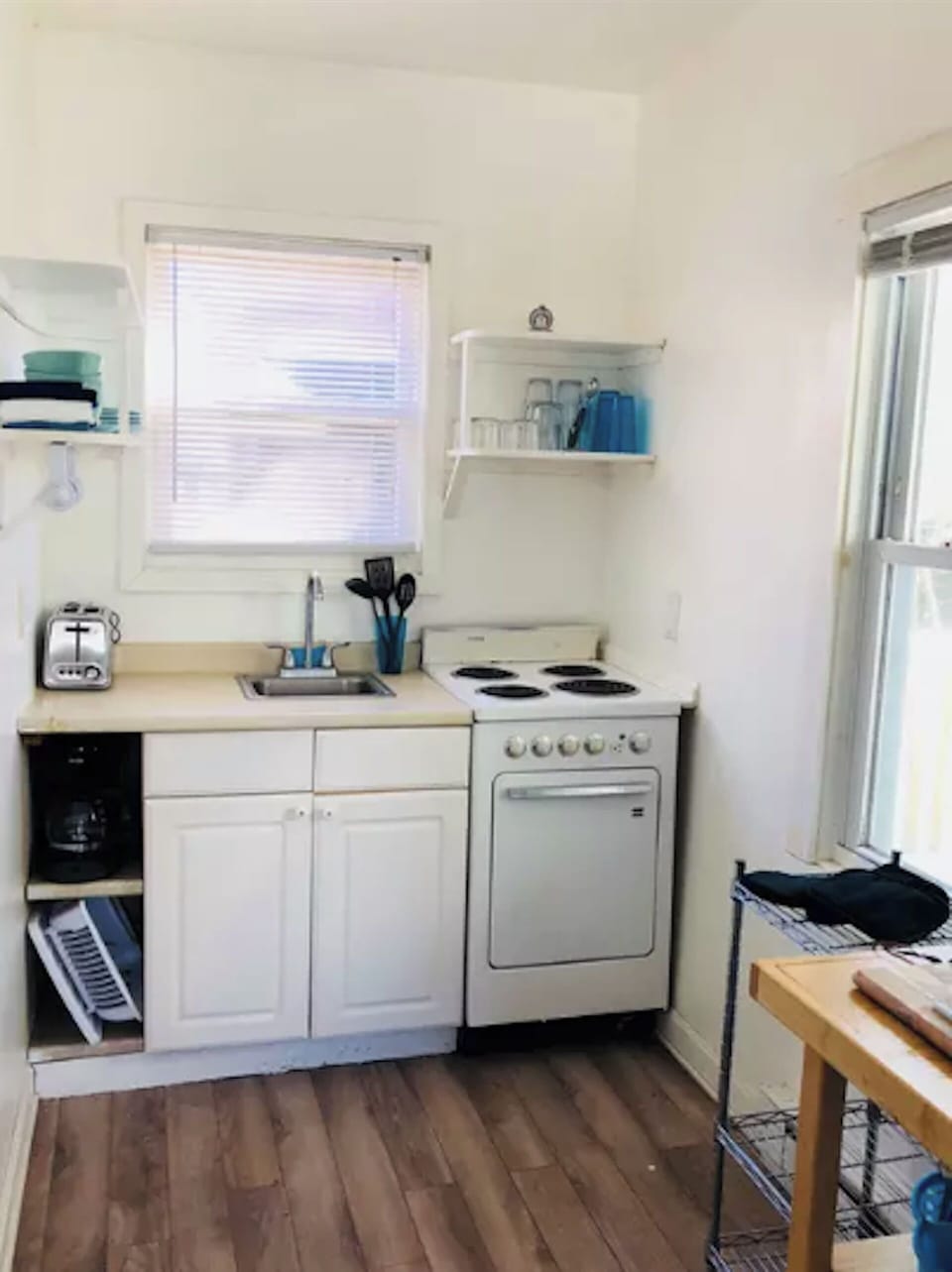 The kitchen has been restocked with new coffee maker and toaster.