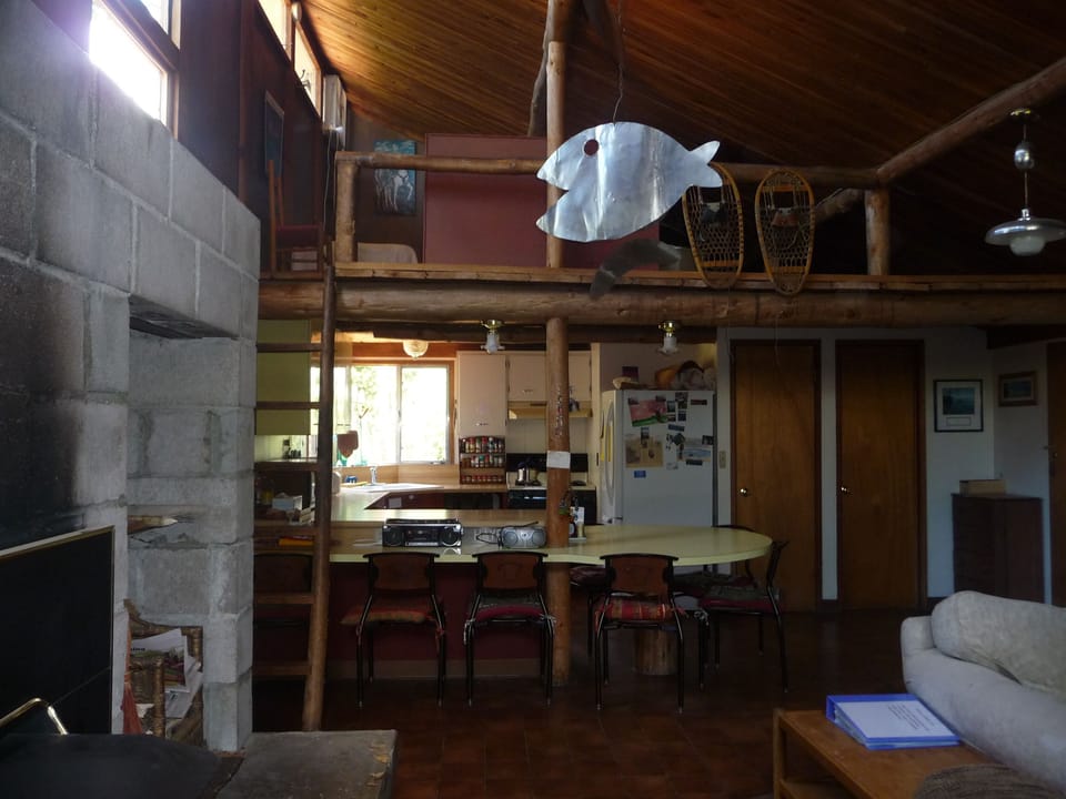 Longer view of kitchen with overhead loft 2012.