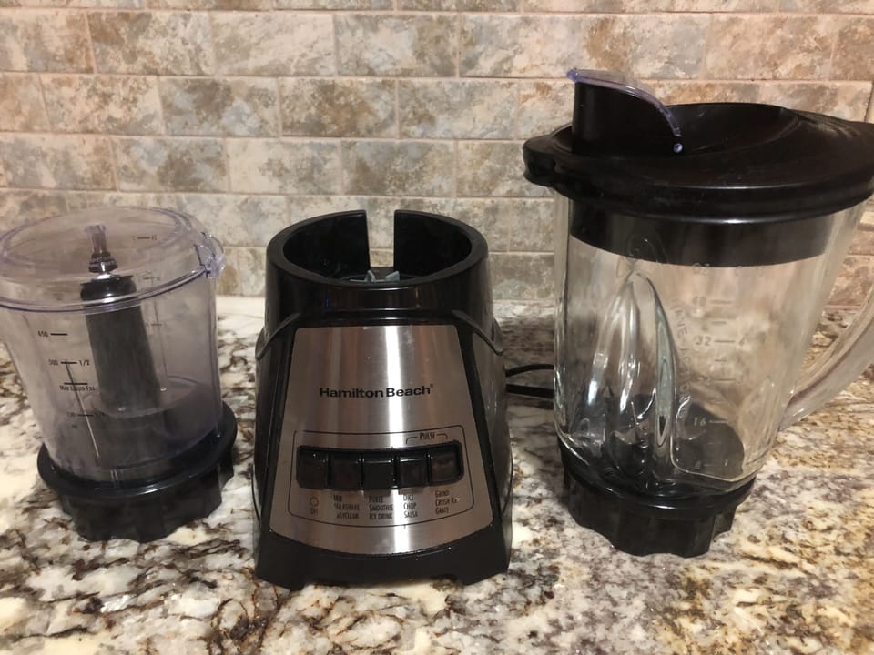 Hamilton Beach blender with separate coffee grinder attachment guests may use