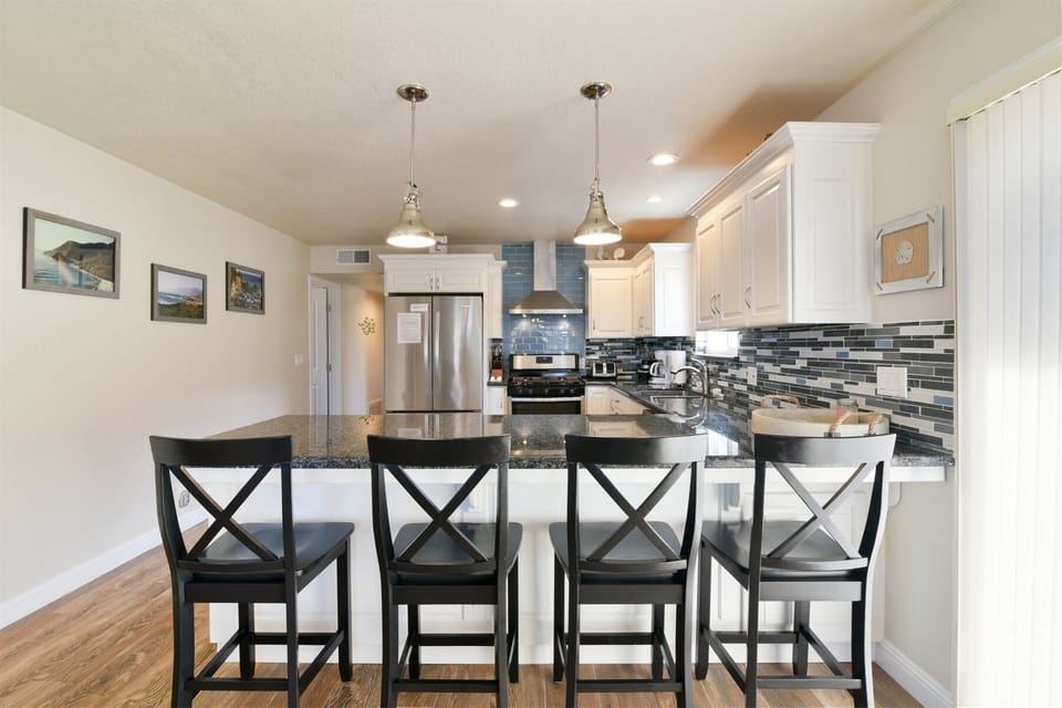 Bar seating in this beautiful kitchen.