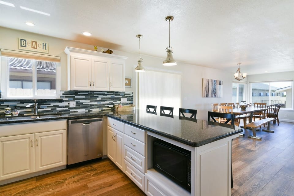 You will be able to cook in this kitchen while visiting with your guests.