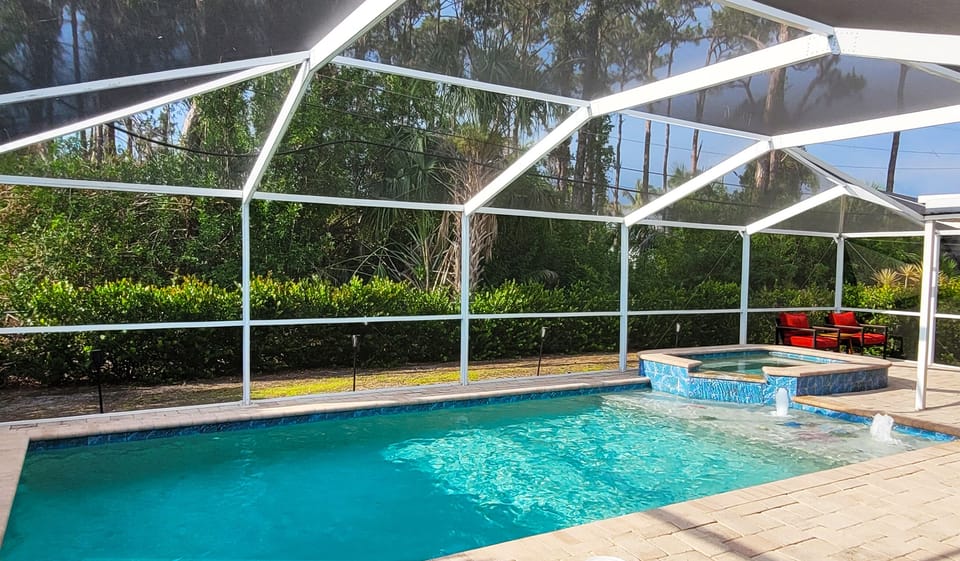Large heated saltwater pool and hot tub.
