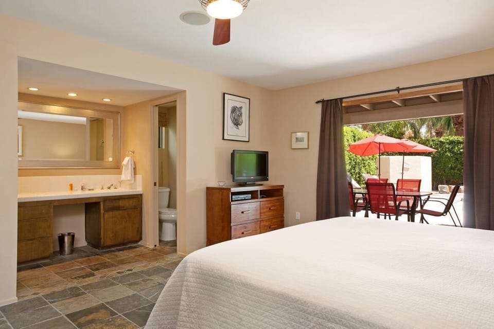 En-suite bathroom and shower in back master bedroom that opens out to pool/spa