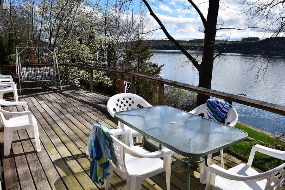Lakefront upper deck off kitchen/living area for dining or sitting on swing