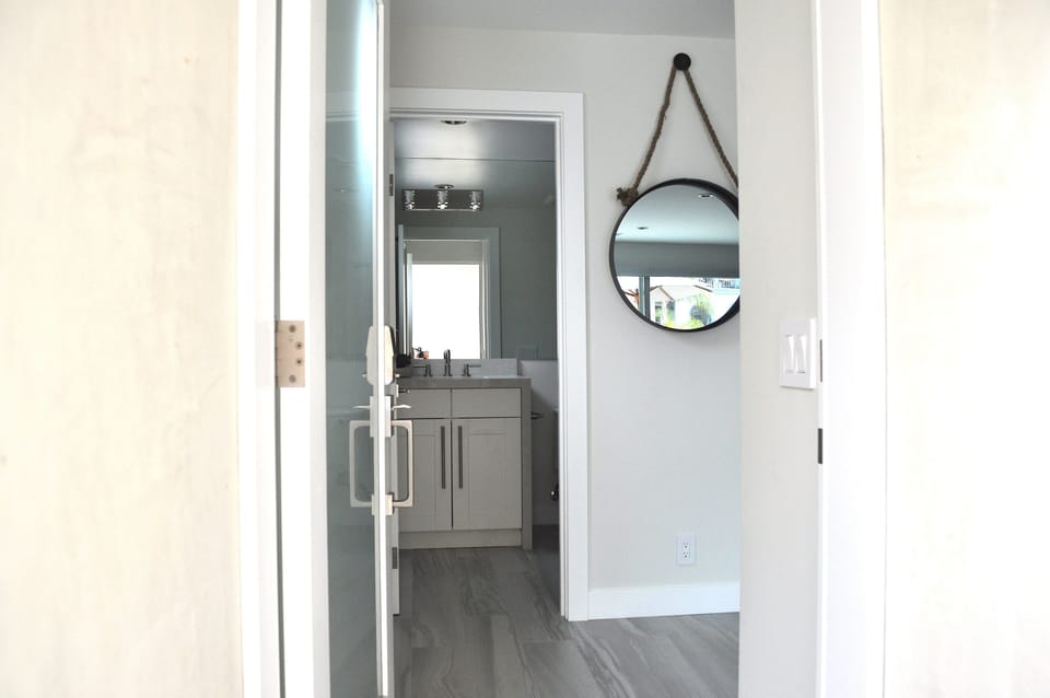 Main Level Restroom view and Front Door Entry