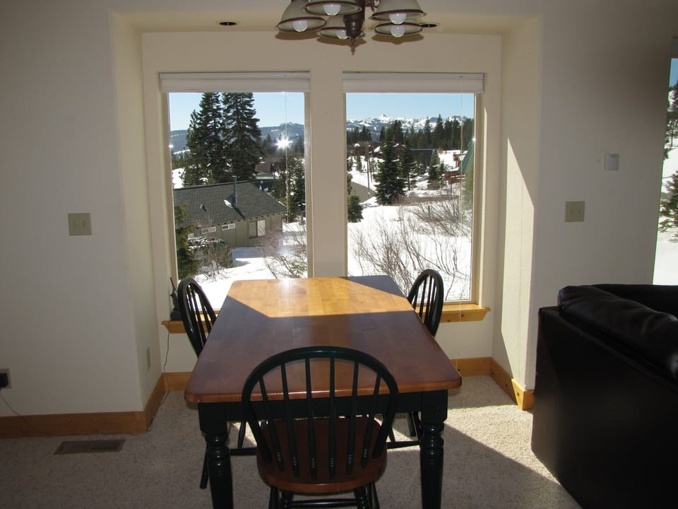A second table that can be moved adjacent to the dining table to seat up to 12.