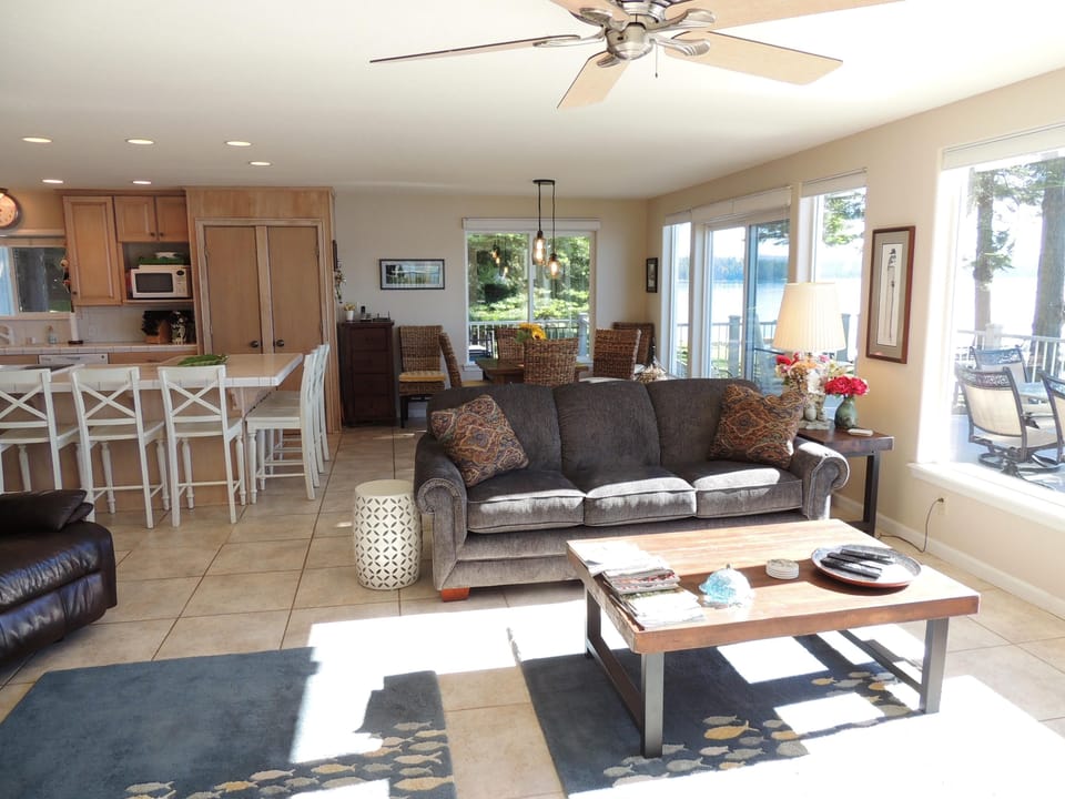 Living Room Toward Dining Room and Facing Deck and Lake